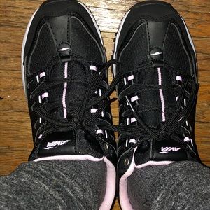 Black AVIA Memory Foam sneakers with black laces.